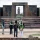 Mini. Travelers at Tiwanaku ruins in Bolivia, near Lake Titi