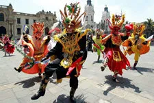 Cover. Virgin of Candelaria Festival dancers in Puno, Peru