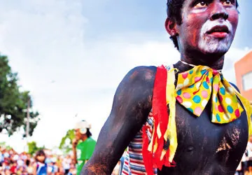 Painted dancer during the Carnaval of Iquitos