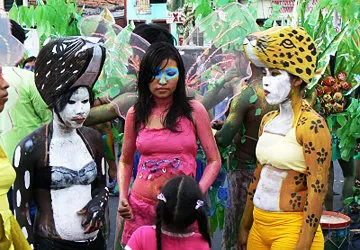 Costumed revelers during the Amazon Carnaval in Peru