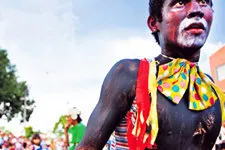 Cover Photo. A painted dancer in Iquitos, Peru, during Carna