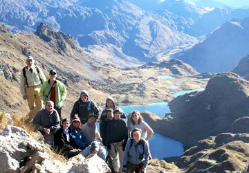 Posing in front of a pristine Andean lake in Lares