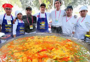 Preparing a giant paella at Mistura Food Festival