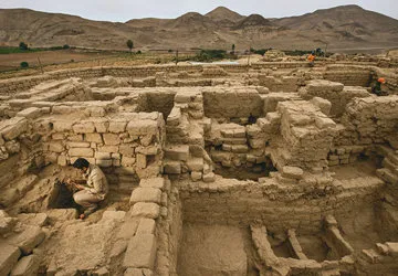 Archaeologist working at Castillo de Huarmey in Peru