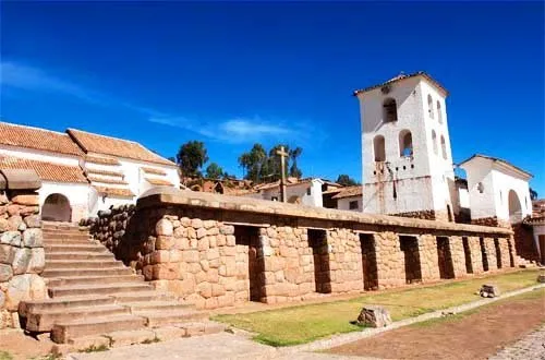 In Inca Wall and Colonial Church in Chinchero Town near Cusc