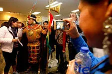 Cover. Welcoming tourists at Cusco airport.