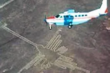 Cessna flying over the Nazca Lines along the Sechura Desert.