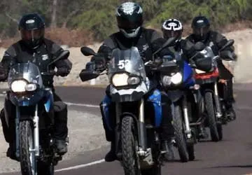 The King of Jordon traveling through Nazca, Peru on motorcyc
