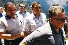 King Abdullah II of Jordan arrives at Machu Picchu in Peru.