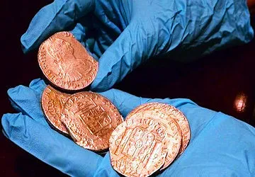 Examining the almost 600,000 golden and silver coins salvage