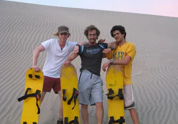 Sandboarding near Huacachina Oasis, near Nazca