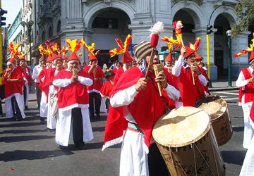 Sikuri musicians marching along the streets of Puno, Peru.