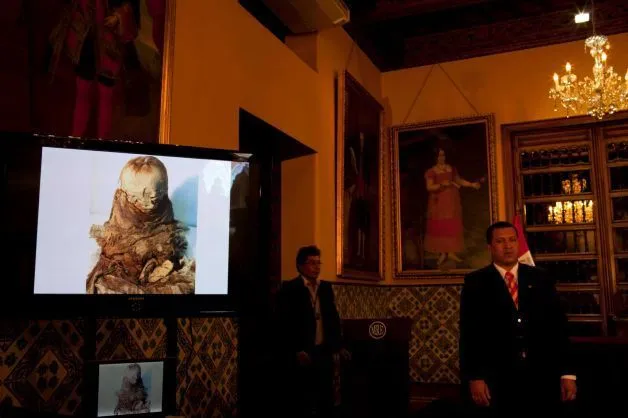 Cover. Bolivia returns trafficked pre-Inca mummy to Peru.