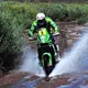 Mini Cover. Dakar Rally motorcyclist in Peru races to Lima.