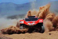 Cover Photo. Dakar racer in the desert of Peru races to Lima