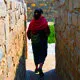 Miniature Cover. Woman explores Pachacamac in Lima Peru