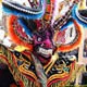Mini Cover. Diablada costume during Candelaria in Puno Peru