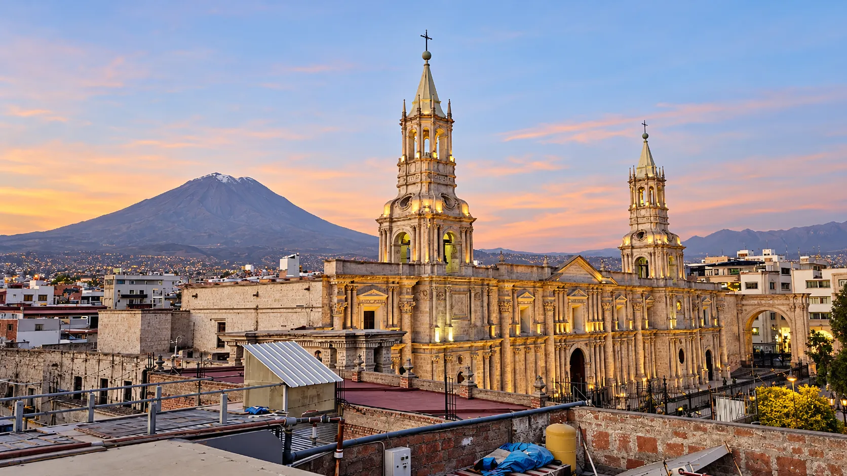 Detail of a white sillar Baroque facade in Arequipa's Historic Center bathed in sunset light