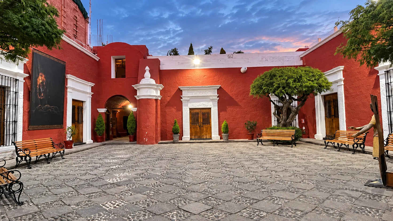 Colorful courtyard and inner alleys of the Santa Catalina Monastery illuminated by afternoon light