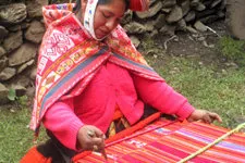 Mujer tejedora, Awanacancha Cusco