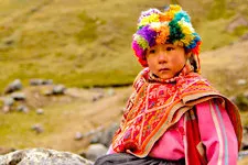 Girl in traditional Andean clothing during the Lares trek to