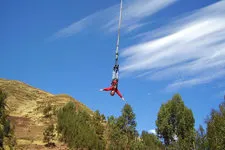 Bungee jump freefall in the Andes near Cusco Peru
