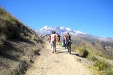 Trekkers on the path to glacier lagoon near La Paz, Bolivia.