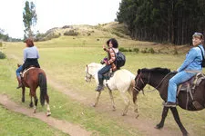 Horseback riding past Inca ruins on the outskirts of Cusco, 