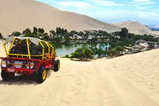 Sandbuggy heading to Huacachina Oasis in desert near Nazca P